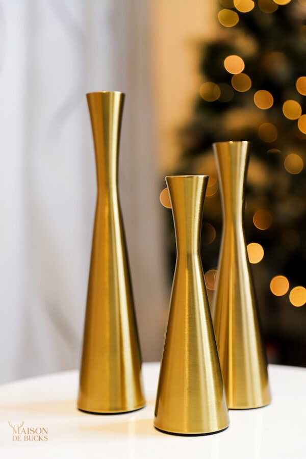 Set of 3 hourglass gold metal candleholders